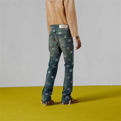 chlopak z gucci i rolexem|Crystal Interlocking G denim pant in blue .